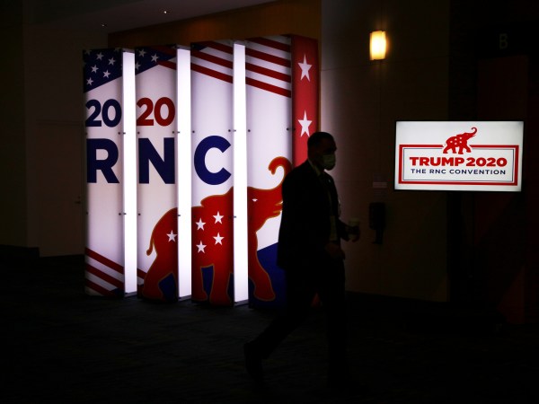 NYTRNC20An RNC sign glows outside the Charlotte Convention Center’s Richardson Ballroom in Charlotte, NC where delegates gather for the roll call vote to renominate Donald J. Trump to be President of the United States and Mike Pence to be Vice President.(Travis Dove for The New York Times)