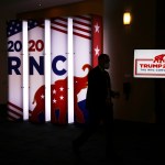NYTRNC20An RNC sign glows outside the Charlotte Convention Center’s Richardson Ballroom in Charlotte, NC where delegates gather for the roll call vote to renominate Donald J. Trump to be President of the United States and Mike Pence to be Vice President.(Travis Dove for The New York Times)