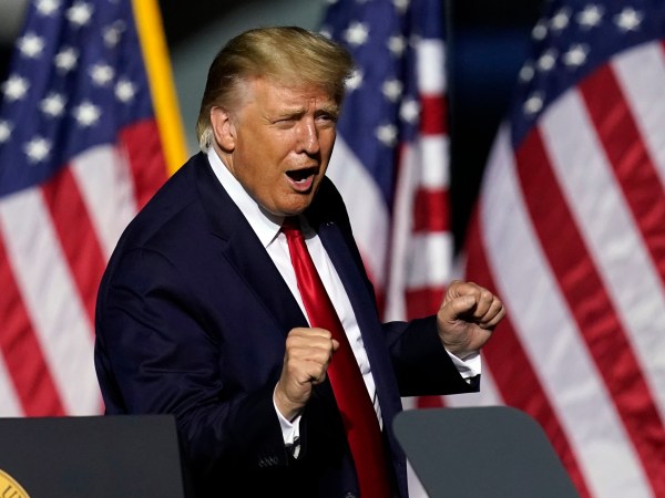 President Trump does a little dance as he leaves the stage during an airport rally Friday, Sept. 25, 2020, in Newport News, Va. (AP Photo/Steve Helber)