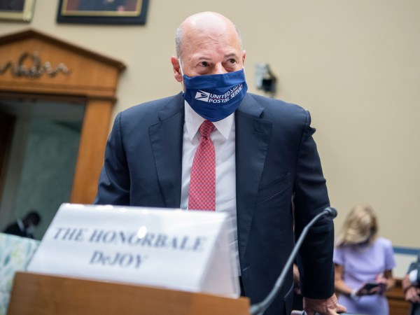 UNITED STATES - AUGUST 24: Postmaster General Louis DeJoy arrives to testifiy during the House Oversight and Reform Committee hearing titled “Protecting the Timely Delivery of Mail, Medicine, and Mail-in Ballots,” in Rayburn House Office Building on Monday, August 24, 2020. (Photo By Tom Williams/CQ Roll Call/Pool)