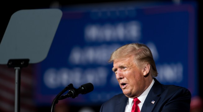 WINSTON SALEM, NC - SEPTEMBER 08: President Donald Trump addresses a crowd during a campaign rally at Smith Reynolds Airport on September 8, 2020 in Winston Salem, North Carolina. The president also made a campaign stop in South Florida on Tuesday. (Photo by Sean Rayford/Getty Images)