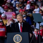SWANTON, OH - SEPTEMBER 21: President Donald Trump charges up the crowd while speaking of the need to win the upcoming election during a campaign rally at the Toledo Express Airport on September 21, 2020 in Swanton, Ohio. (Photo by Matthew Hatcher/Getty Images)
