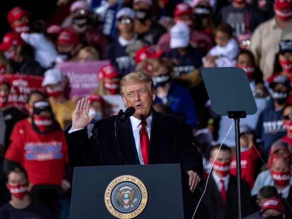 SWANTON, OH - SEPTEMBER 21: President Donald Trump charges up the crowd while speaking of the need to win the upcoming election during a campaign rally at the Toledo Express Airport on September 21, 2020 in Swanton, Ohio. (Photo by Matthew Hatcher/Getty Images)