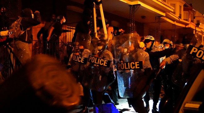 Police officers in formation during a protest in response to the police shooting of Walter Wallace Jr. on Monday, October 26, 2020 in Philadelphia, Pa. Police officers fatally shot the 27-year-old Black man during a confrontation Monday afternoon in West Philadelphia that quickly raised tensions in the neighborhood. Shortly before 4 p.m., two officers fired their guns at the man in the 6100 block of Locust Street. Police then transported the man to Penn Presbyterian Medical Center. He was later pronounced dead at the hospital. JESSICA GRIFFIN / The Philadelphia Inquirer