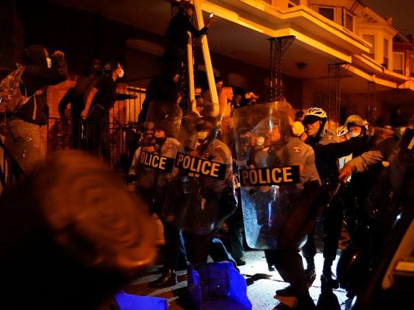 Police officers in formation during a protest in response to the police shooting of Walter Wallace Jr. on Monday, October 26, 2020 in Philadelphia, Pa. Police officers fatally shot the 27-year-old Black man during a confrontation Monday afternoon in West Philadelphia that quickly raised tensions in the neighborhood. Shortly before 4 p.m., two officers fired their guns at the man in the 6100 block of Locust Street. Police then transported the man to Penn Presbyterian Medical Center. He was later pronounced dead at the hospital. JESSICA GRIFFIN / The Philadelphia Inquirer