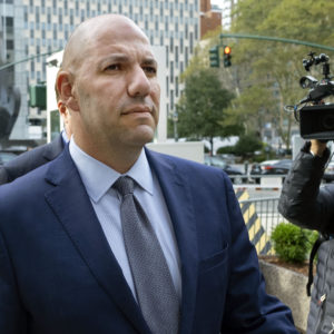FILE- In this Oct. 17, 2019 file photo, David Correia walks from federal court in New York.  (AP Photo/Craig Ruttle, FIle)
