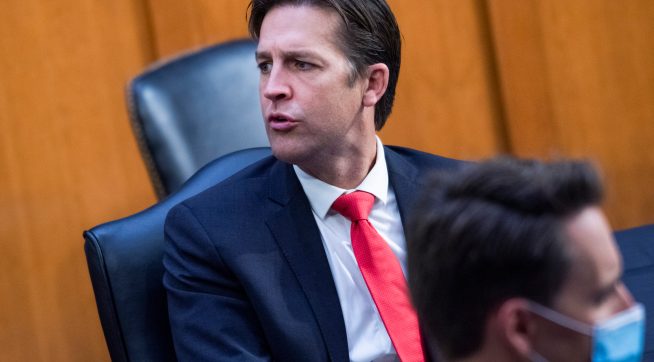 UNITED STATES - OCTOBER 15: Sens. Ben Sasse, R-Neb., left, and Josh Hawley, R-Mo., attend the Senate Judiciary Committee executive business meeting on Supreme Court justice nominee Amy Coney Barrett in Hart Senate Office Building on Thursday, October 15, 2020. (Photo By Tom Williams/CQ Roll Call/POOL)