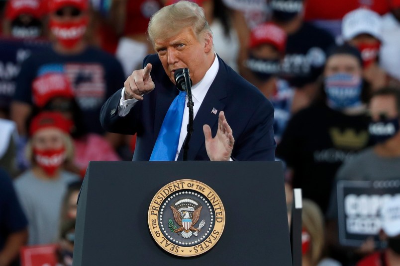 CARSON CITY, NV - OCTOBER 18: President Donald Trump gestures during a campaign rally on October 18, 2020 in Carson City, Nevada. With 16 days to go before the November election, President Trump is back on the campaign trail with multiple daily events as he continues to campaign against Democratic presidential nominee Joe Biden. (Photo by Stephen Lam/Getty Images)