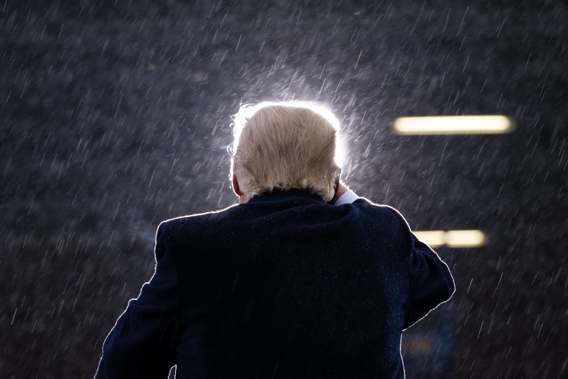 President Donald Trump speaks during a campaign rally at Capital Region International Airport, Tuesday, Oct. 27, 2020, in Lansing, Mich. (AP Photo/Evan Vucci)