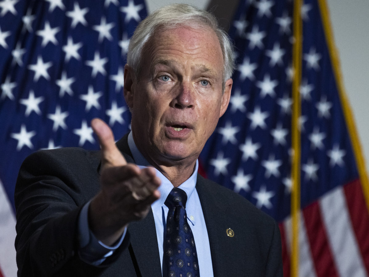 UNITED STATES - OCTOBER 21: Sen. Ron Johnson, R-Wis., talks with reporters after the Senate Republican  luncheon in Hart Building on Wednesday, October 21, 2020. (Photo By Tom Williams/CQ Roll Call/)