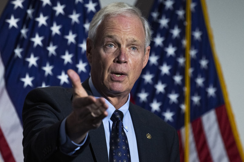 UNITED STATES - OCTOBER 21: Sen. Ron Johnson, R-Wis., talks with reporters after the Senate Republican  luncheon in Hart Building on Wednesday, October 21, 2020. (Photo By Tom Williams/CQ Roll Call/)