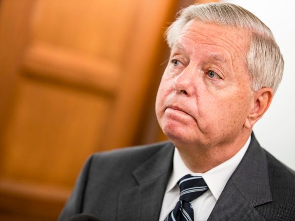 WASHINGTON, DC - OCTOBER 22: Committee Chairman Lindsey Graham (R-SC) makes a statement after voting in the Judiciary Committee to move the nomination of Judge Amy Coney Barrett to the Supreme Court out of committee and on to the Senate for a full vote on October 22, 2020 in Washington, DC. Judge Amy Coney Barrett was nominated by President Donald Trump to fill the vacancy left by Justice Ruth Bader Ginsburg who passed away in September. (Photo by Samuel Corum/Getty Images) *** Local Caption *** Lindsey Graham