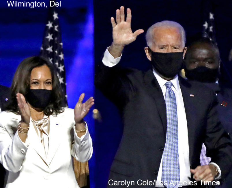 WILMINGTON, DE - NOVEMBER 07: (L-R) Douglas Emhoff, Vice-President-elect Kamal Harris, President-elect Joe Biden and Dr. Jill Biden wave to supporters after defeating Donald Trump in the 2020 U.S. Presidential election on Saturday, Nov.7 , 2020 in Wilmington, DE. (Carolyn Cole / Los Angeles Times)