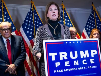 UNITED STATES - NOVEMBER 19: Sydney Powell, attorney for President Donald Trump, conducts a news conference at the Republican National Committee on lawsuits regarding the outcome of the 2020 presidential election on Thursday, November 19, 2020. Trump attorney Rudolph Giuliani, left, also attended. (Photo By Tom Williams/CQ Roll Call)