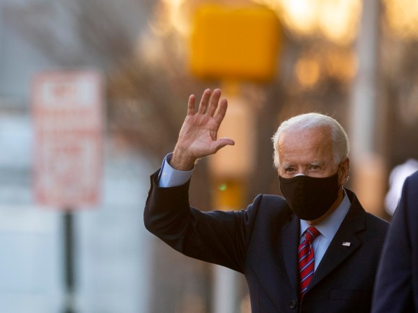 WILMINGTON, DE - NOVEMBER 23: President-elect Joe Biden waves as he departs the Queen Theatre after meeting virtually with the United States Conference of Mayors on November 23, 2020 in Wilmington, Delaware. As President-elect Biden waits to be approved for official national security briefings, the names of top members of his national security team are being announced to the public. (Photo by Mark Makela/Getty Images)