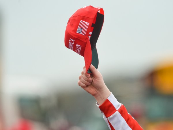 A supporter of President Donald J. Trump hold up their Make America Great Again hat. At the Reading Regional Airport in Bern Township, PA Saturday afternoon October 31, 2020 where United States President Donald J. Trump spoke during a campaign rally for his bid for reelection.