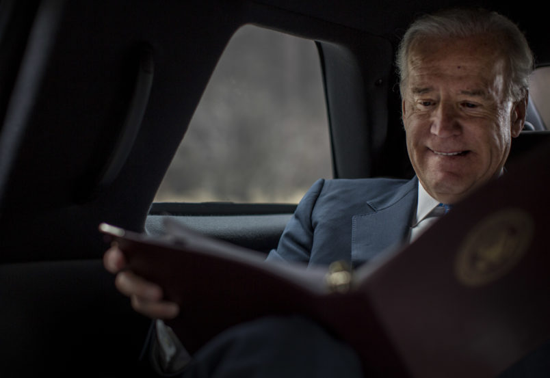 ROCKVILLE, MD - MARCH 13:  Reading briefing materials during a planning meeting with staff, Vice President Joe Biden is driven back to the White House after speaking to lawmakers, woman against violence advocates, and constituents concerning reducing  domestic violence homicides in Rockville, Maryland, on Wednesday, March 13, 2013. (Photo by Melina Mara/The Washington Post)
