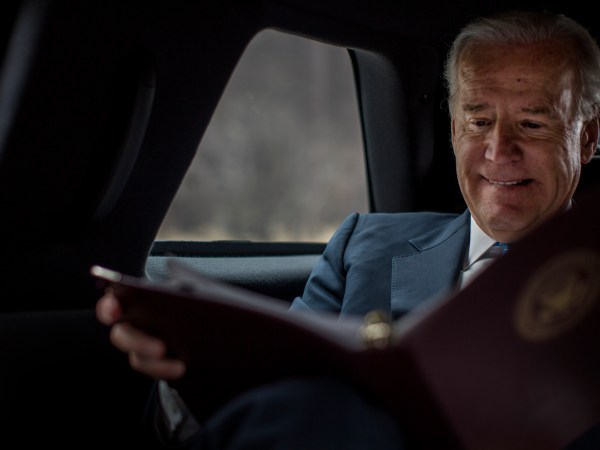 ROCKVILLE, MD - MARCH 13:  Reading briefing materials during a planning meeting with staff, Vice President Joe Biden is driven back to the White House after speaking to lawmakers, woman against violence advocates, and constituents concerning reducing  domestic violence homicides in Rockville, Maryland, on Wednesday, March 13, 2013. (Photo by Melina Mara/The Washington Post)