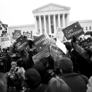 WASHINGTON DC - DECEMBER 11: Protesters outside the Supreme Court on the eve of the decision on Gore v Bush that will determine the outcome of the Presidential Election on December 11, 2000 in Washington DC. (Photo by David Hume Kennerly/Getty Images)