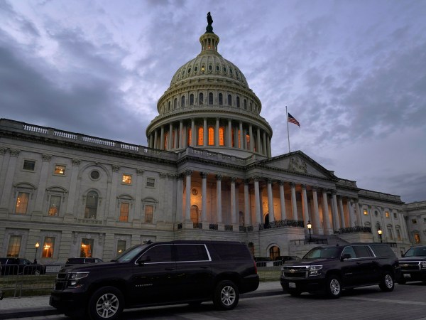 Dusk falls over the Capitol, Monday, Dec. 21, 2020, in Washington. Congressional leaders have hashed out a massive, year-end catchall bill that combines $900 billion in COVID-19 aid with a $1.4 trillion spending bill and reams of other unfinished legislation on taxes, energy, education and health care. (AP Photo/Jacquelyn Martin)