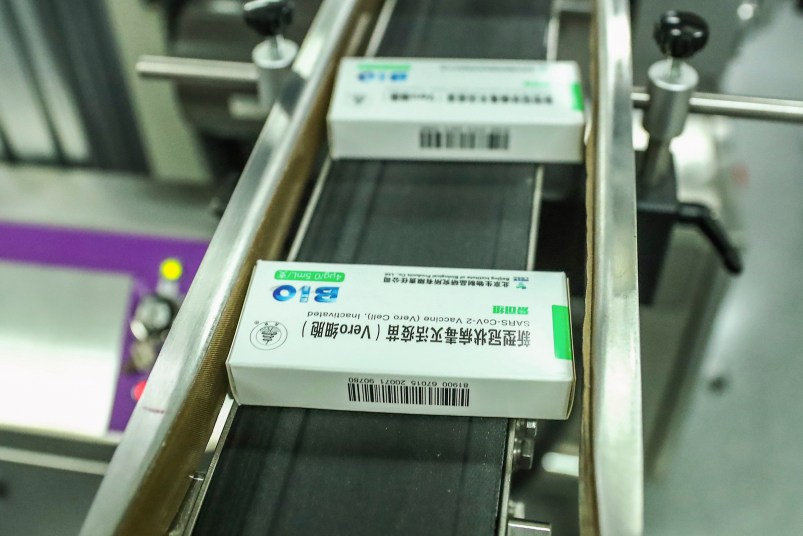 In this photo Dec. 25, 2020 released by Xinhua News Agency, packages of COVID-19 inactivated vaccine products are seen at a production plant of the Beijing Biological Products Institute Co., Ltd, a unit of state-owned Sinopharm in Beijing. The Chinese drugmaker said Wednesday, Dec. 30, 2020 its coronavirus vaccine was found to be 79.3% effective at preventing infection in preliminary data from the final round of testing, moving Beijing closer to possibly being able to fulfill its pledge to supply other developing countries.(Zhang Yuwei/Xinhua via AP)