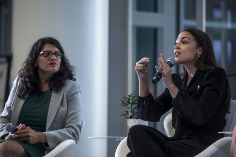 WASHINGTON, DC - SEPTEMBER 11: Rep. Alexandria Ocasio-Cortez (D-NY) speaks during a town hall hosted by the NAACP on September 11, 2019 in Washington, DC.  Also pictured is Rep. Rashida Tlaib (D-MI).  (Photo by Zach Gibson/Getty Images)