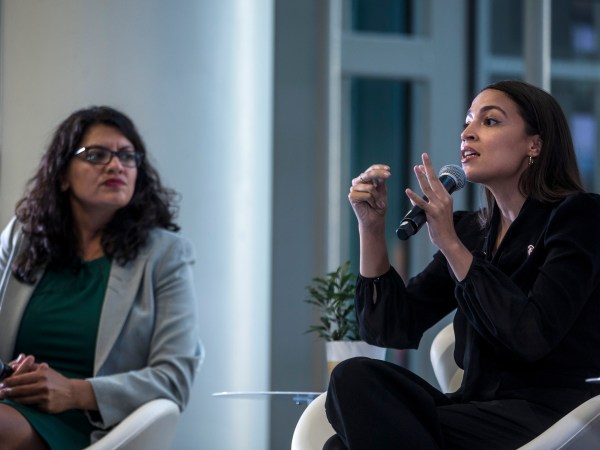 WASHINGTON, DC - SEPTEMBER 11: Rep. Alexandria Ocasio-Cortez (D-NY) speaks during a town hall hosted by the NAACP on September 11, 2019 in Washington, DC.  Also pictured is Rep. Rashida Tlaib (D-MI).  (Photo by Zach Gibson/Getty Images)