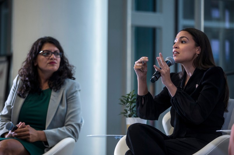 WASHINGTON, DC - SEPTEMBER 11: Rep. Alexandria Ocasio-Cortez (D-NY) speaks during a town hall hosted by the NAACP on September 11, 2019 in Washington, DC.  Also pictured is Rep. Rashida Tlaib (D-MI).  (Photo by Zach Gibson/Getty Images)