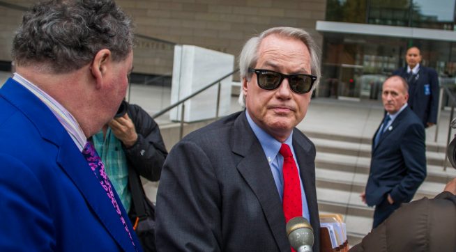 LOS ANGELES, CA - DECEMBER 03: British diver Vernon Unsworth; L, watches his attorneys; Mark Stephen; R, and L. Lin Wood; C, speaks to members of the media while they arrive at US District Court, Central District of California in Los Angeles, U.S. on December 3, 2019 in Los Angeles, California. The British diver sued the Tesla CEO Elon Musk over calling him "'Pedo Guy" and rapist. (Photo by Apu Gomes/Getty Images)