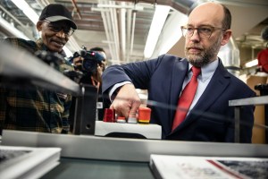 WASHINGTON, DC - FEBRUARY 06: Acting Director of the Office of Management and Budget Russ Vought presses the button that starts the machine that will print copies of President Donald Trumps proposed budget for the U.S. Government for the 2021 Fiscal Year are printed at the Government Publishing Office ahead of its release next week on February 6, 2020 in Washington, DC. Once released, the budget will be debated in Congress before it becomes official. (Photo by Samuel Corum/Getty Images) *** Local Caption *** Russ Vought