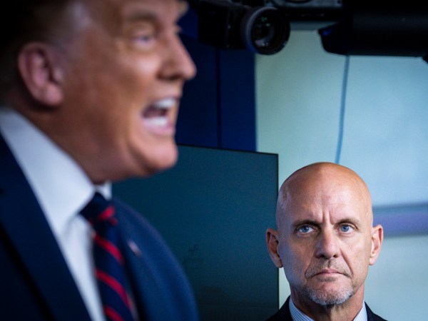 WASHINGTON, DC - AUGUST 23: FDA Commissioner Stephen Hahn looks on as President Donald Trump announces that the Food and Drug Administration is issuing an emergency authorization for blood plasma as a coronavirus treatment during a press conference in James S. Brady Briefing Room at the White House on on August 23, 2020 in Washington, DC. The move by the FDA comes after President Trump accused the FDA of slow-walking the therapy to harm his reelection chances.(Photo by Pete Marovich/Getty Images)