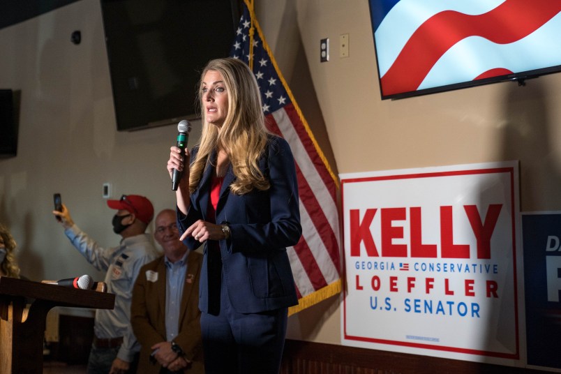 CUMMING, GA - NOVEMBER 13: Republican Senators David Perdue and Kelly Loeffler spoke at a campaign event to supporters on November 13, 2020 in Cumming, Georgia. Both are running for reelection. (Photo by Megan Varner/Getty Images)
