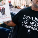 ATLANTA, GA - NOVEMBER 18: A man wearing a 'Defund the Media' QAnon shirt is seen at a "Stop the Steal" rally against the results of the U.S. Presidential election outside the Georgia State Capitol on November 18, 2020 in Atlanta, Georgia. (Photo by Elijah Nouvelage/Getty Images)