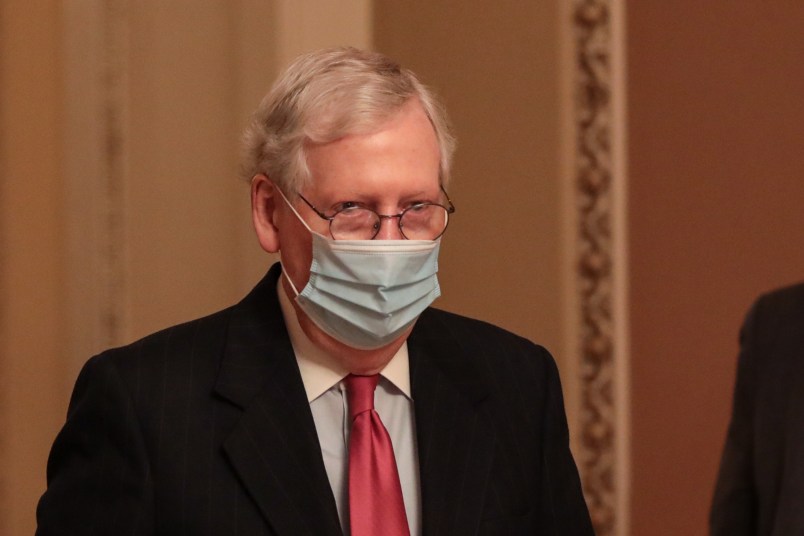 WASHINGTON, DC - DECEMBER 21: Senate Majority Leader Mitch McConnell (R-KY) walks to his office after leaving the Senate Floor at the U.S. Capitol on December 21, 2020 in Washington, DC. The House and Senate are set to vote today on a roughly $900 billion pandemic relief bill to bolster the U.S. economy amid the continued coronavirus pandemic that would be the second-biggest economic rescue measure in the nations history. (Photo by Cheriss May/Getty Images)