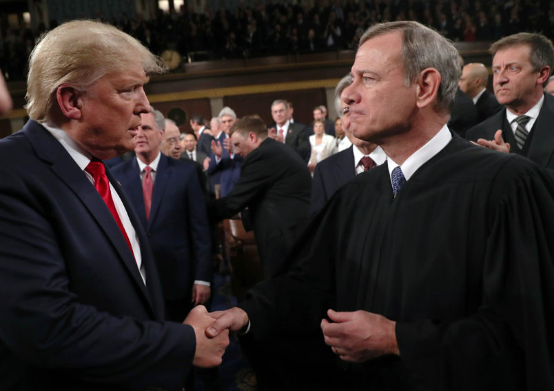 U.S. President Donald Trump greets Supreme Court Chief Justice John Roberts as he arrives to deliver his State of the Union address to a joint session of the U.S. Congress in the House Chamber of the U.S. Capitol in Washington, U.S. February 4, 2020. REUTERS/Leah Millis/POOL