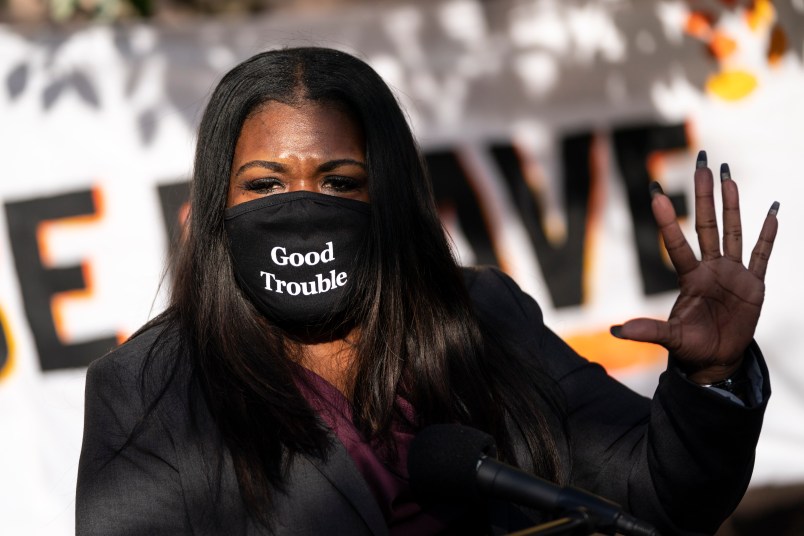 WASHINGTON, DC - NOVEMBER 19: Congresswoman-elect Rep. Cori Bush (D-MO) speaks outside of the Democratic National Committee headquarters on November 19, 2020 in Washington, DC. Bush, Alexandria Ocasio-Cortez and others called on the incoming Joe Biden administration to take bold action on issues of climate change and economic inequalities. (Photo by Drew Angerer/Getty Images)