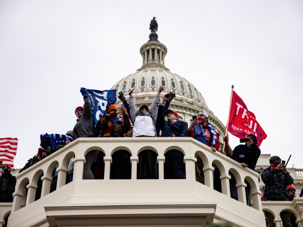 WASHINGTON, DC - JANUARY 06: Pro-Trump supporters storm the US Capitol following a rally with President Donald Trump on January 6, 2021 in Washington, DC. Trump supporters gathered in the nation's capital today to protest the ratification of President-elect Joe Biden's Electoral College victory over President Trump in the 2020 election. (Photo by Samuel Corum/Getty Images)