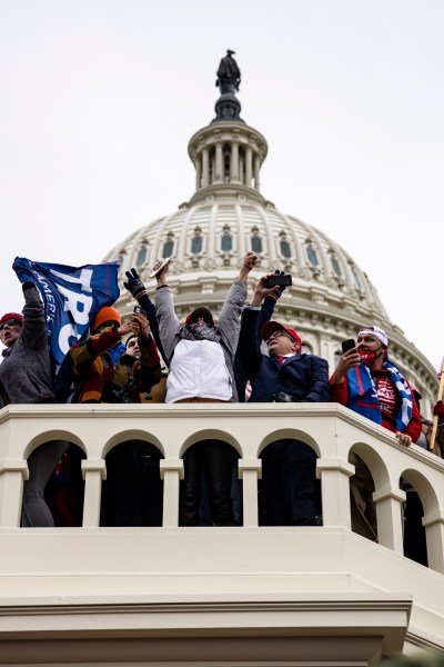 WASHINGTON, DC - JANUARY 06: Pro-Trump supporters storm the US Capitol following a rally with President Donald Trump on January 6, 2021 in Washington, DC. Trump supporters gathered in the nation's capital today to protest the ratification of President-elect Joe Biden's Electoral College victory over President Trump in the 2020 election. (Photo by Samuel Corum/Getty Images)