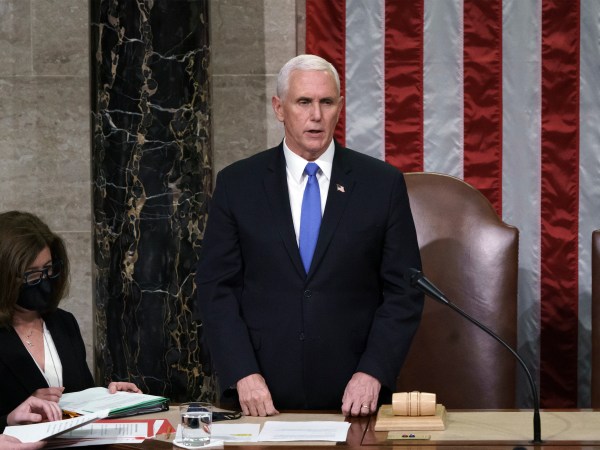Vice President Mike Pence readS the final certification of Electoral College votes cast in November's presidential election during a joint session of Congress after working through the night, at the Capitol in Washington, Thursday, Jan. 7, 2021. Violent protesters loyal to President Donald Trump stormed the Capitol Wednesday, disrupting the process. (AP Photo/J. Scott Applewhite, Pool)