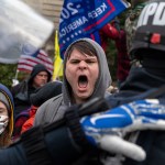 WASHINGTON DC - JANUARY 6: Pro-Trump protestors clash with police during the tally of electoral votes that that would certify Joe Biden as the winner of the U.S. presidential election outside the US Capitol in Washington, DC on Wednesday, January 6, 2021. (Amanda Andrade-Rhoades/For The Washington Post)