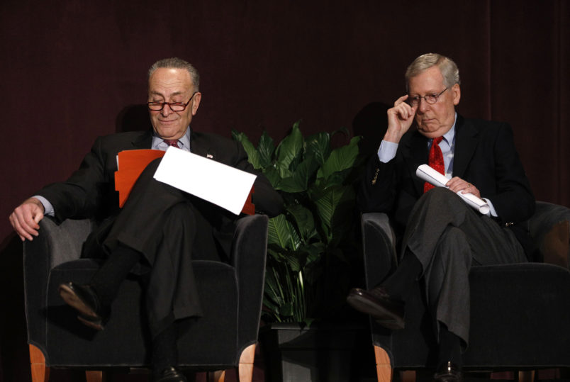 LOUISVILLE, KY - FEBRUARY 12: U.S. Senate Majority Leader Mitch McConnell (right) (R-KY) and U.S. Senate Democratic Leader Chuck Schumer (D-NY) wait on the stage together at the University of Louisville's McConnell Center where Schumer was scheduled to speak February 12, 2018 in Louisville, Kentucky. Sen. Schumer spoke at the event as part of the Center's Distinguished Speaker Series, and Sen. McConnell introduced him. (Photo by Bill Pugliano/Getty Images)