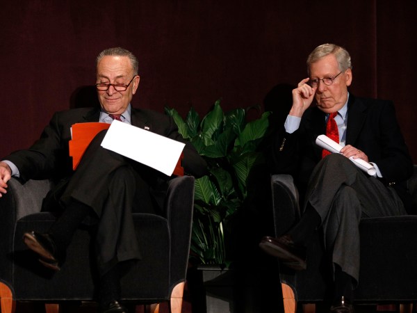 LOUISVILLE, KY - FEBRUARY 12: U.S. Senate Majority Leader Mitch McConnell (right) (R-KY) and U.S. Senate Democratic Leader Chuck Schumer (D-NY) wait on the stage together at the University of Louisville's McConnell Center where Schumer was scheduled to speak February 12, 2018 in Louisville, Kentucky. Sen. Schumer spoke at the event as part of the Center's Distinguished Speaker Series, and Sen. McConnell introduced him. (Photo by Bill Pugliano/Getty Images)