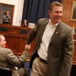 officespace2/112102 --  Member-elect Rick Renzi, R-Ariz., right,is congratulated after he drew number 4 in the freshmen member room selection by member-elect Katherine Harris staffer, Dan Berger, who drew number 1.