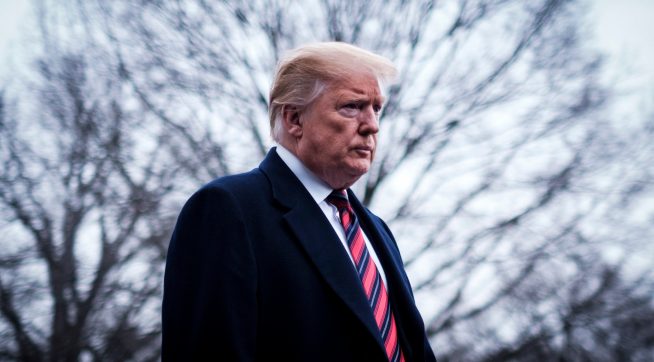 WASHINGTON, DC - JANUARY 19: President Trump stops to speak to reporters as he prepared to board Marine One on the South Lawn of the White House on January 19, 2019 in Washington, DC. Trump is traveling to Dover Air Force Base in Delaware to visit with families four Americans who were killed in an explosion Wednesday in Syria. (Photo by Pete Marovich/Getty Images)