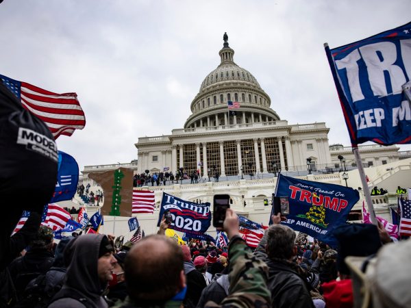 WASHINGTON, DC - JANUARY 06: Pro-Trump supporters storm the US Capitol following a rally with President Donald Trump on January 6, 2021 in Washington, DC. Trump supporters gathered in the nation's capital today to protest the ratification of President-elect Joe Biden's Electoral College victory over President Trump in the 2020 election. (Photo by Samuel Corum/Getty Images)