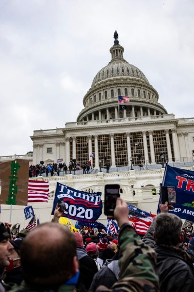 WASHINGTON, DC - JANUARY 06: Pro-Trump supporters storm the US Capitol following a rally with President Donald Trump on January 6, 2021 in Washington, DC. Trump supporters gathered in the nation's capital today to protest the ratification of President-elect Joe Biden's Electoral College victory over President Trump in the 2020 election. (Photo by Samuel Corum/Getty Images)
