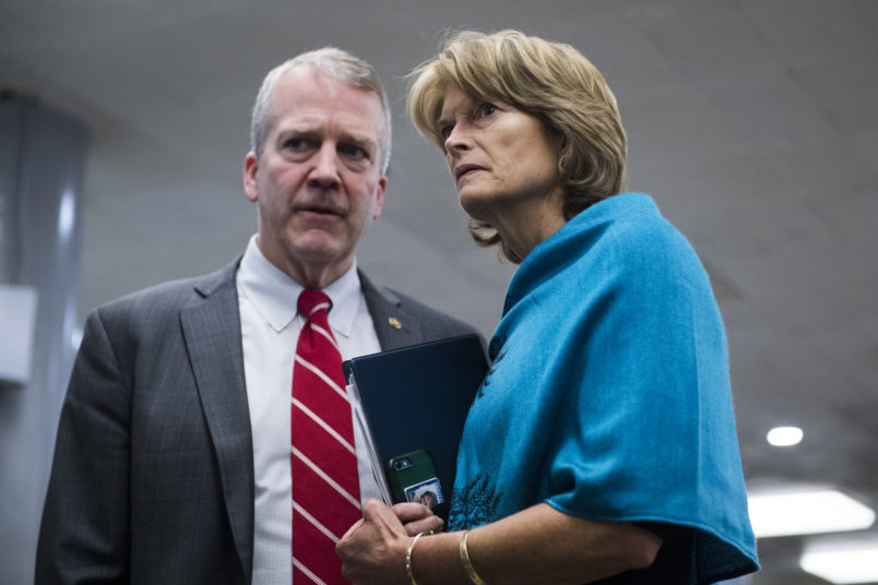 UNITED STATES - FEBRUARY 14: Sens. Dan Sullivan, R-Alaska, and Lisa Murkowski, R-Alaska, are seen in the Capitol after the Senate voted on the bipartisan government funding bill on Thursday, February 14, 2019.(Photo By Tom Williams/CQ Roll Call)