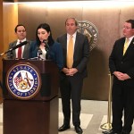 Laura Loomer speaks about a bill that seeks to stop social media censorship, on Tuesday, Jan. 21, 2020, in Tallahassee, Fla. Standing behind Loomer, from left, are state Rep. Anthony Sabatini (R-Fla.), Republican state Sen. Joe Gruters and Republican state Rep. Randy Fine. (Skyler Swisher/Sun Sentinel/TNS)