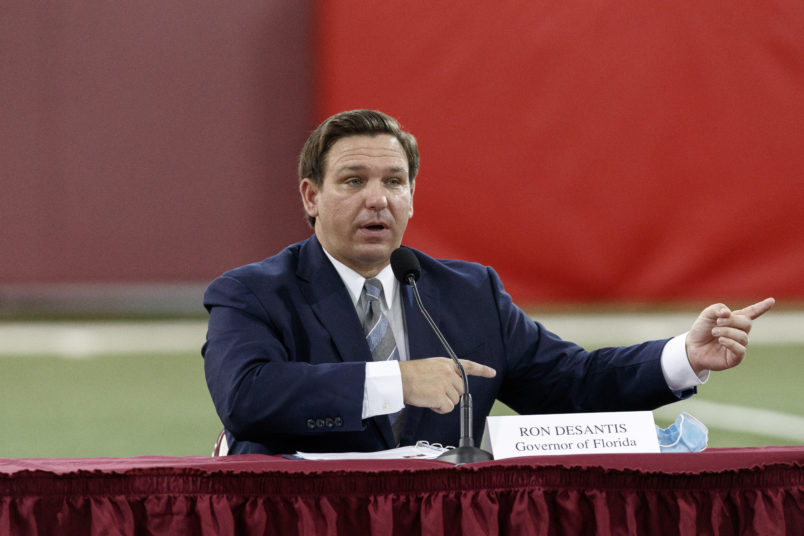TALLAHASSEE, FL - AUGUST 11: Florida Governor Ron DeSantis speaks during a collegiate athletics roundtable about fall sports at the Albert J. Dunlap Athletic Training Facility on the campus of Florida State University on August 11, 2020 in Tallahassee, Florida. (Photo by Don Juan Moore/Getty Images) *** Local Caption *** Ron DeSantis