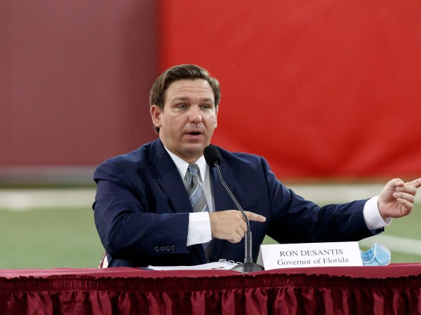 TALLAHASSEE, FL - AUGUST 11: Florida Governor Ron DeSantis speaks during a collegiate athletics roundtable about fall sports at the Albert J. Dunlap Athletic Training Facility on the campus of Florida State University on August 11, 2020 in Tallahassee, Florida. (Photo by Don Juan Moore/Getty Images) *** Local Caption *** Ron DeSantis